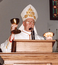 Cardinal Schotte with the chalice and paten that were sent as gifts to the College community by Pope Saint John Paul II